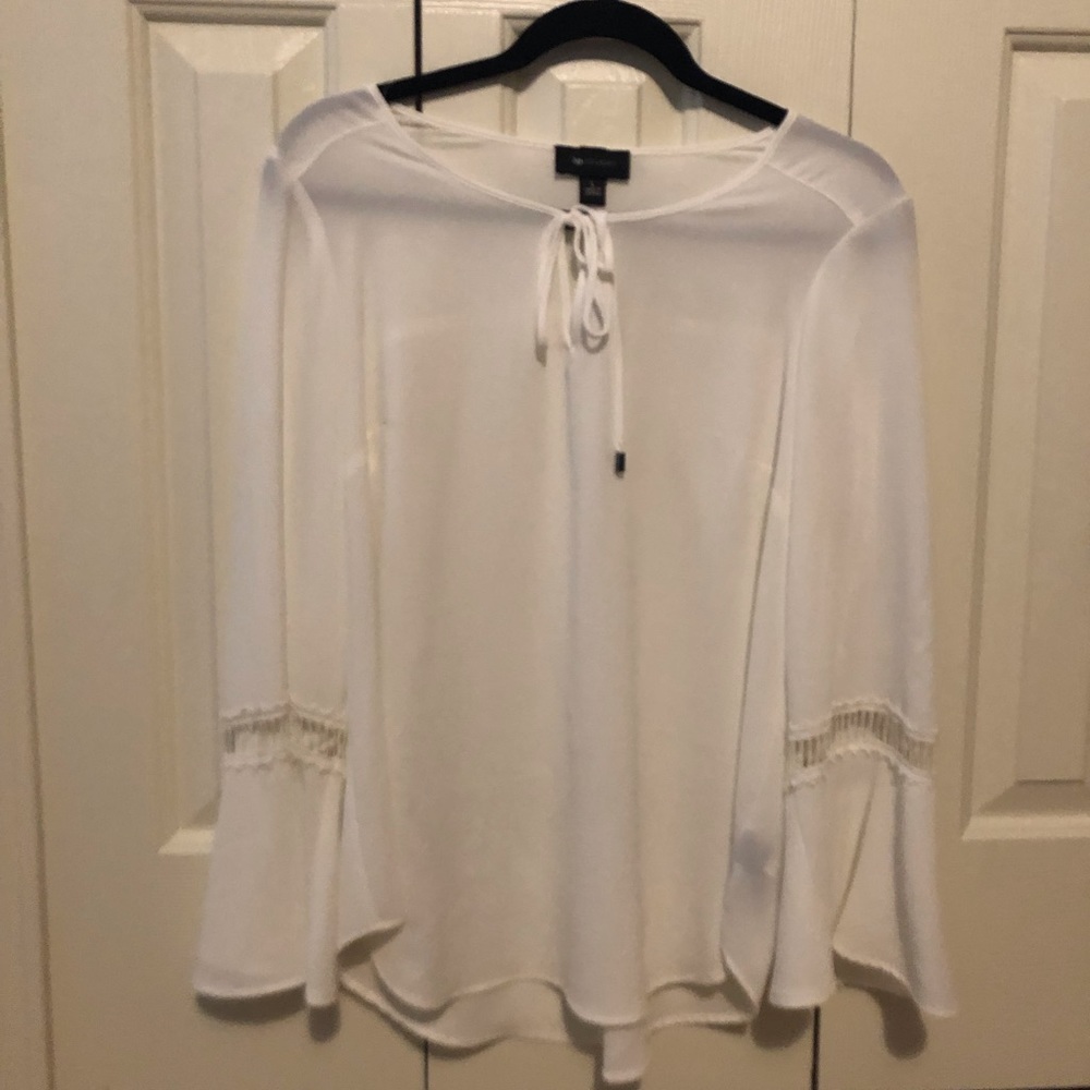 Sheer blouse.